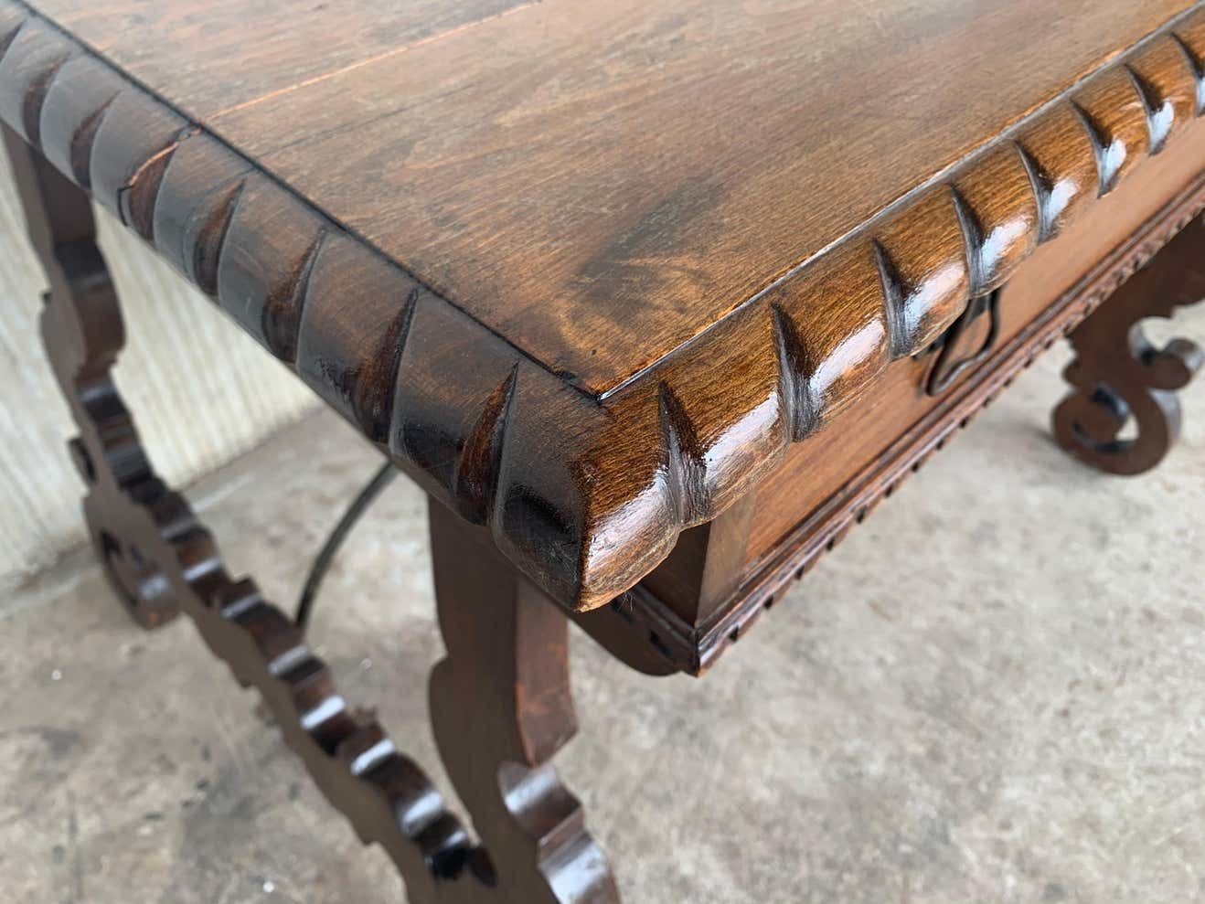 photo furniture Early 20th Spanish Desk With Lyre Legs And Carved Edges On Top