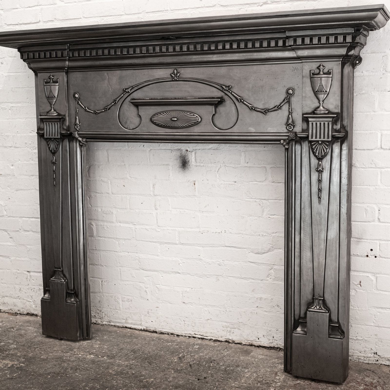 2800.0 Antique Polished Cast Iron Fireplace Surround photo