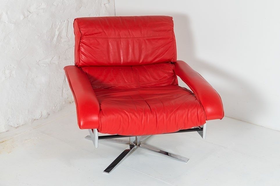 photo vintage Mid Century Pieff Red Leather Tubular Chrome Swivel Chair With Footstool Ottoman