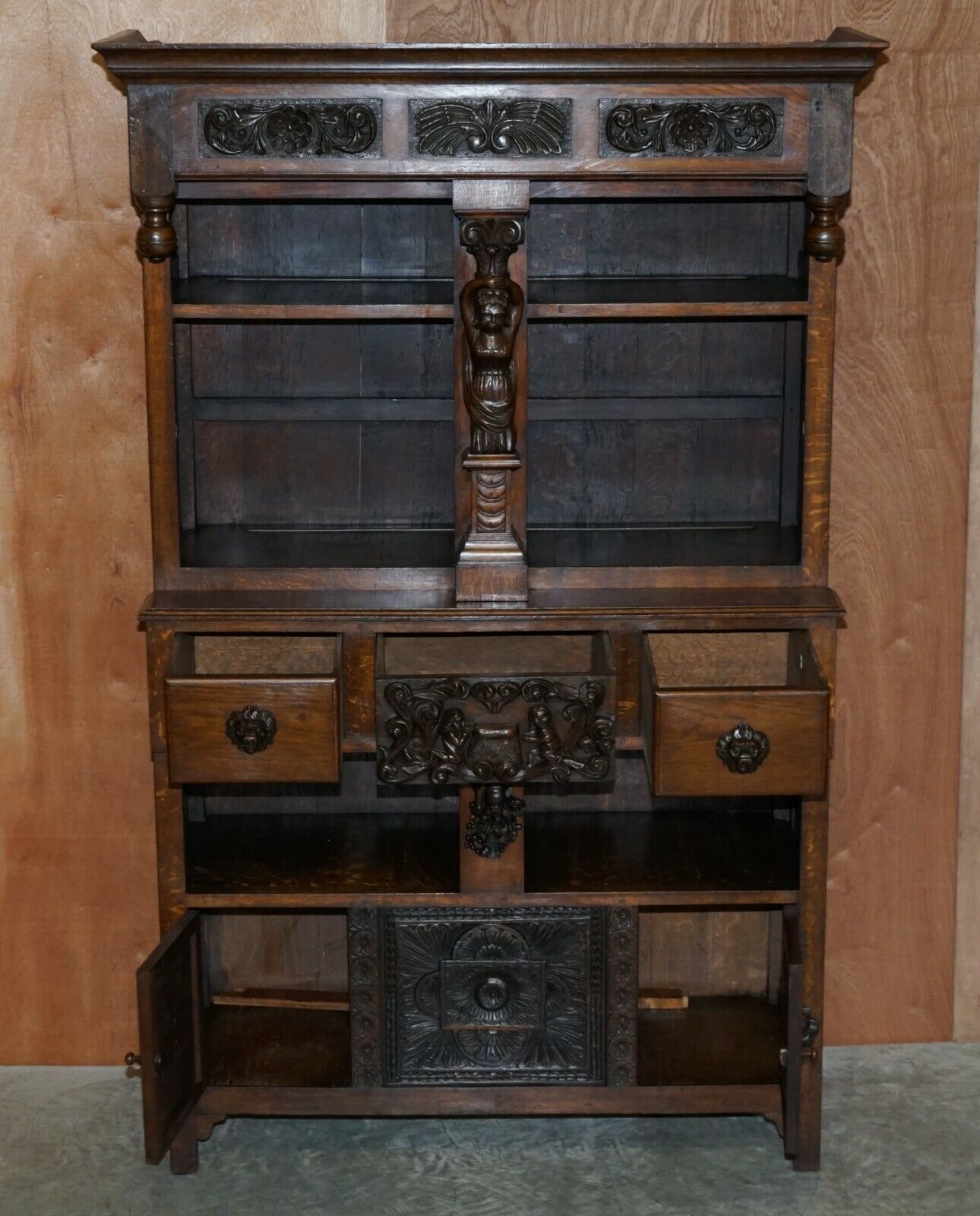 photo for sale Large Heavily Carved Bookcase Cupboard With Ornate Cherub Putti & Lion Figures