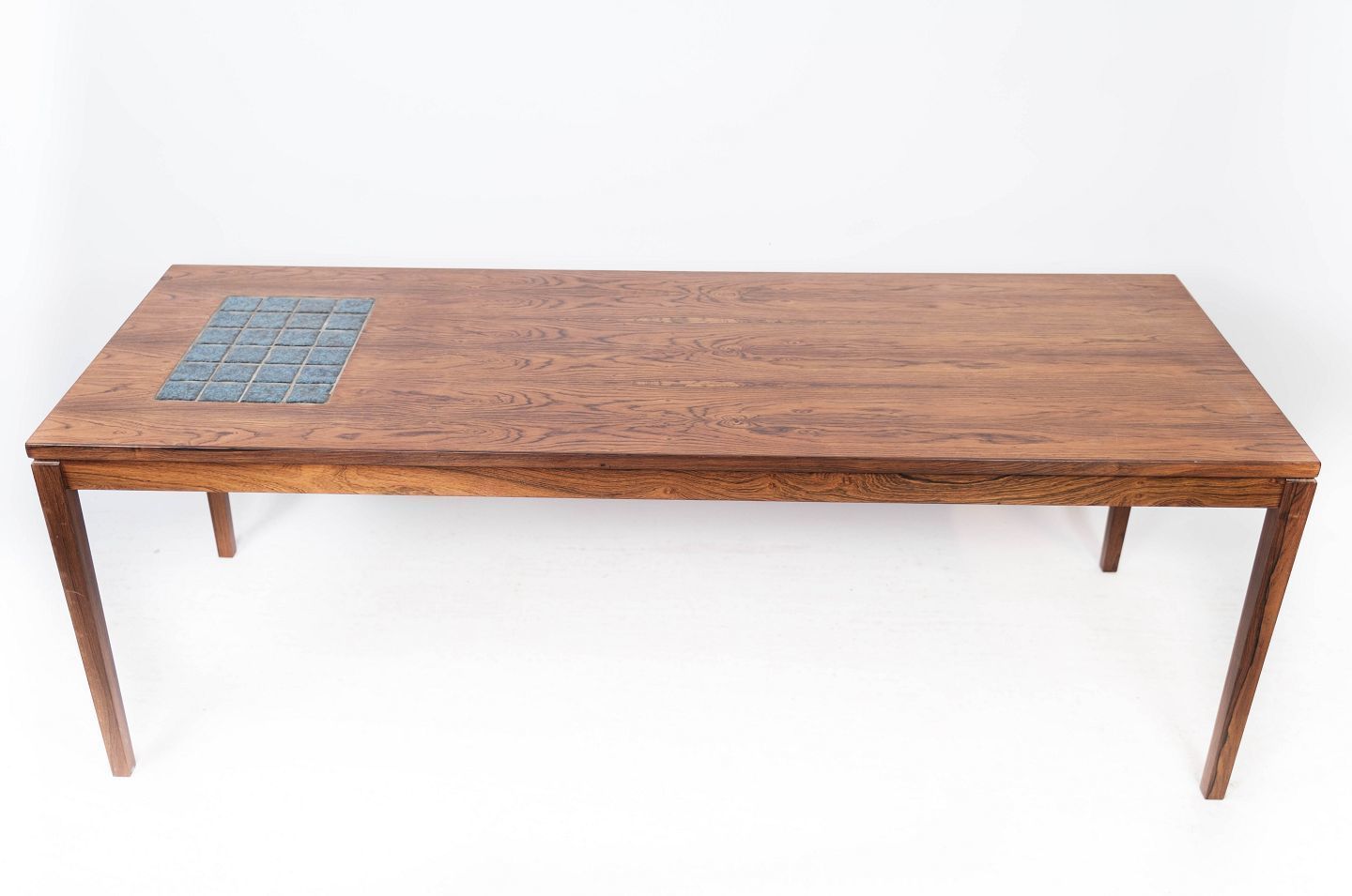 Coffee Table In Rosewood With Blue Tiles Of Danish Design From The 1960s.