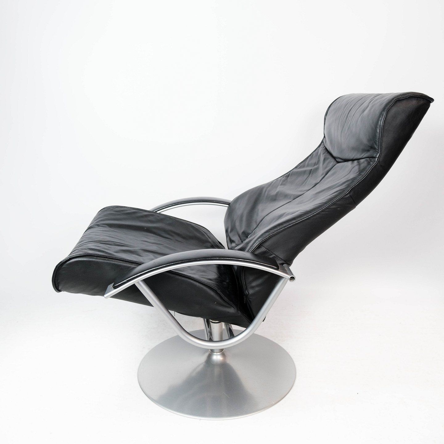 Armchair With Stool Upholstered In Black Leather And Metal Frame, By Danish Design From The 1970s. photo Furniture