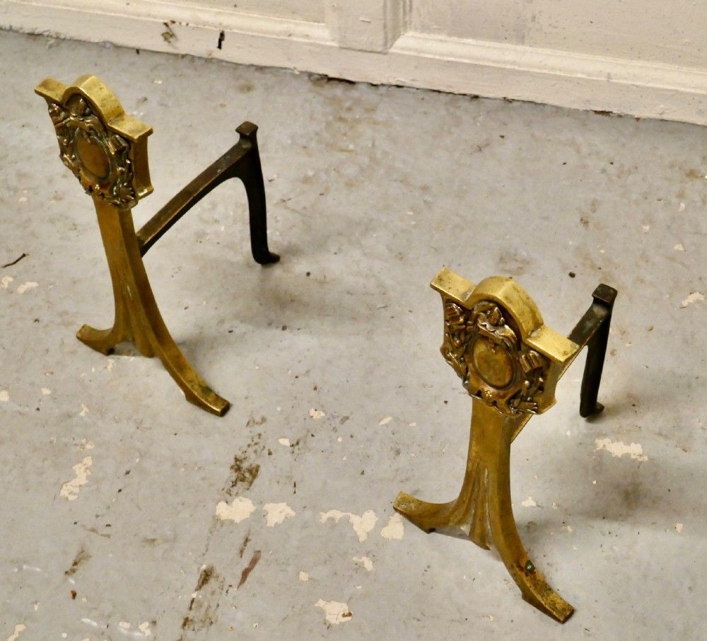 An Elegant Pair Of 19th Century Brass Andirons Or Fire Dogs photo for sale