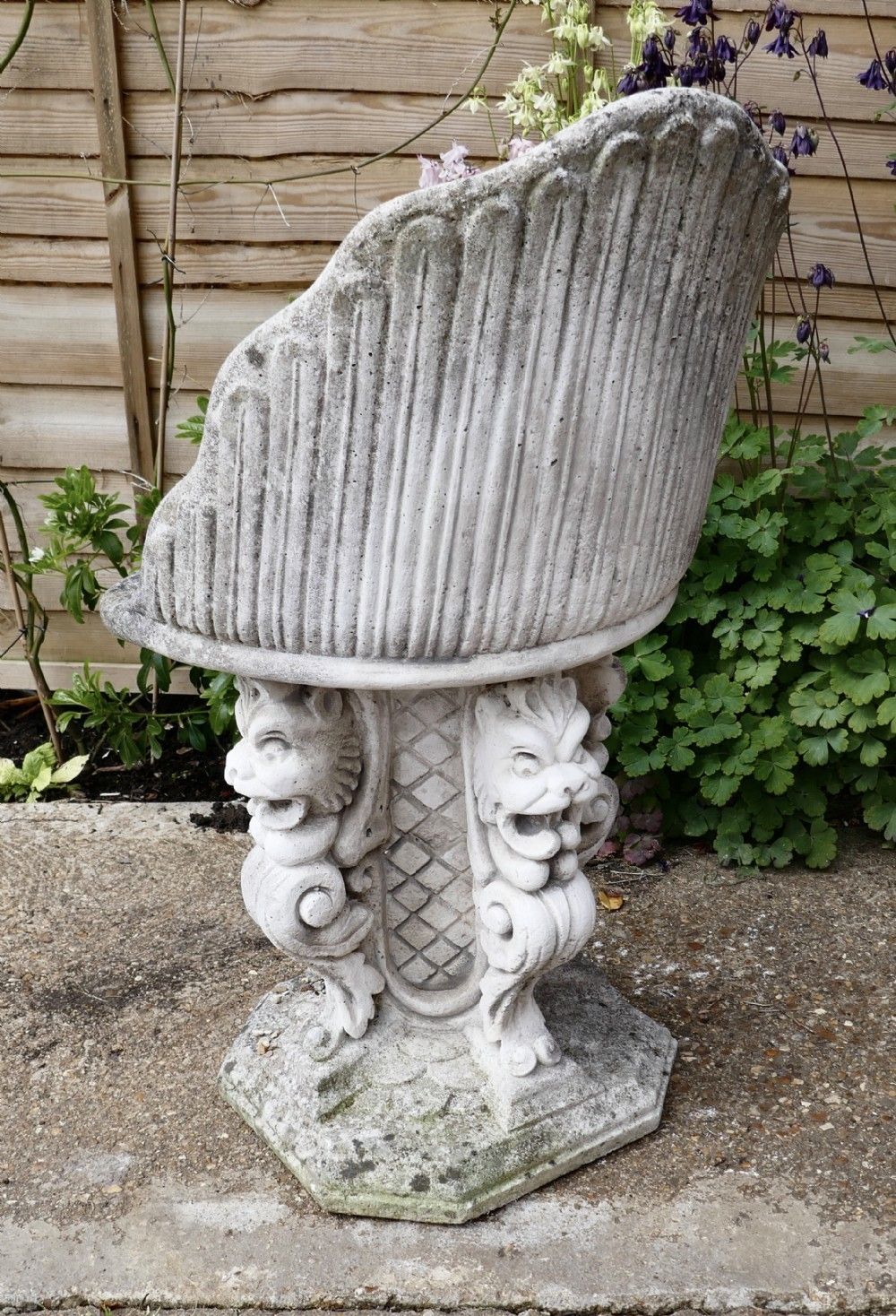 Old Weathered Garden Seat With Gargoyles photo 1194.0