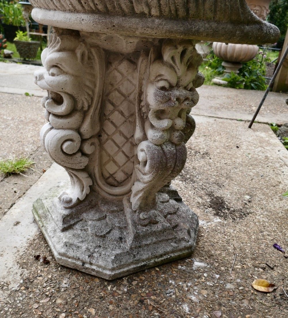 Old Weathered Garden Seat With Gargoyles photo buy