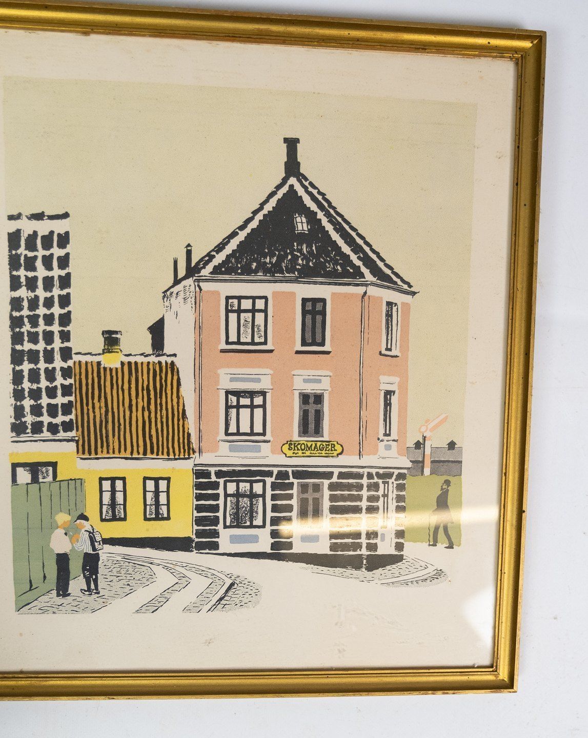 Print With Urban Motif And Gilded Wooden Frame. photo furniture