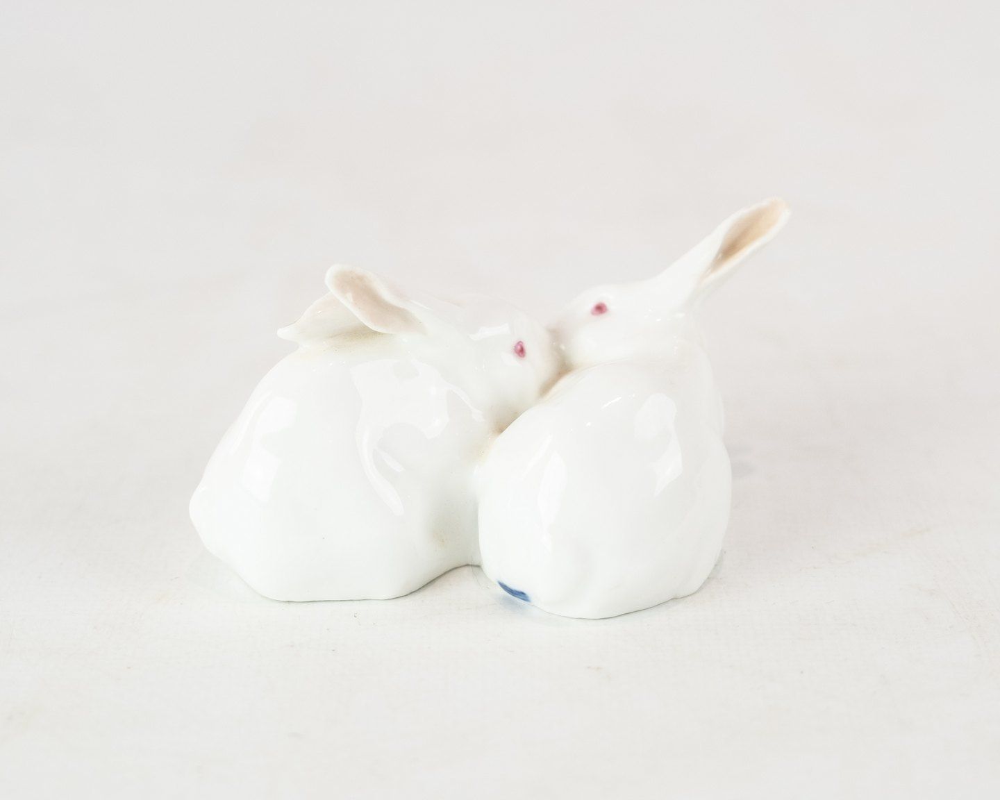 Royal Copenhagen Porcelain Figure In The Shape Of A Pair Of Bunnies. photo for sale