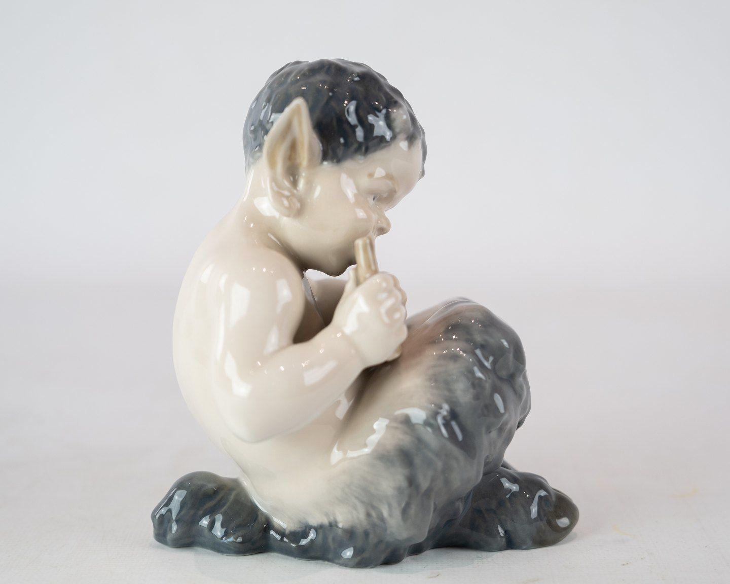 Kgl. Porcelain Pan Figure With Flute, No .: 1736 By Royal Copenhagen. photo furniture