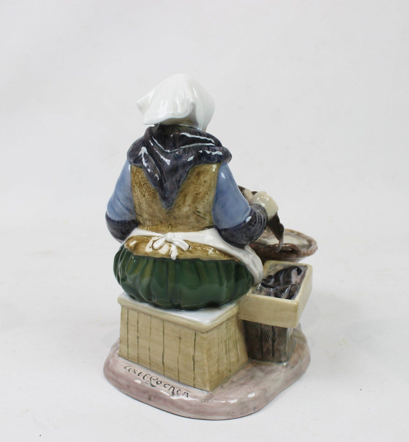 Porcelain Figure Of A Fisherwoman, No .: 2233, By Axel Locher For B&G. photo for sale