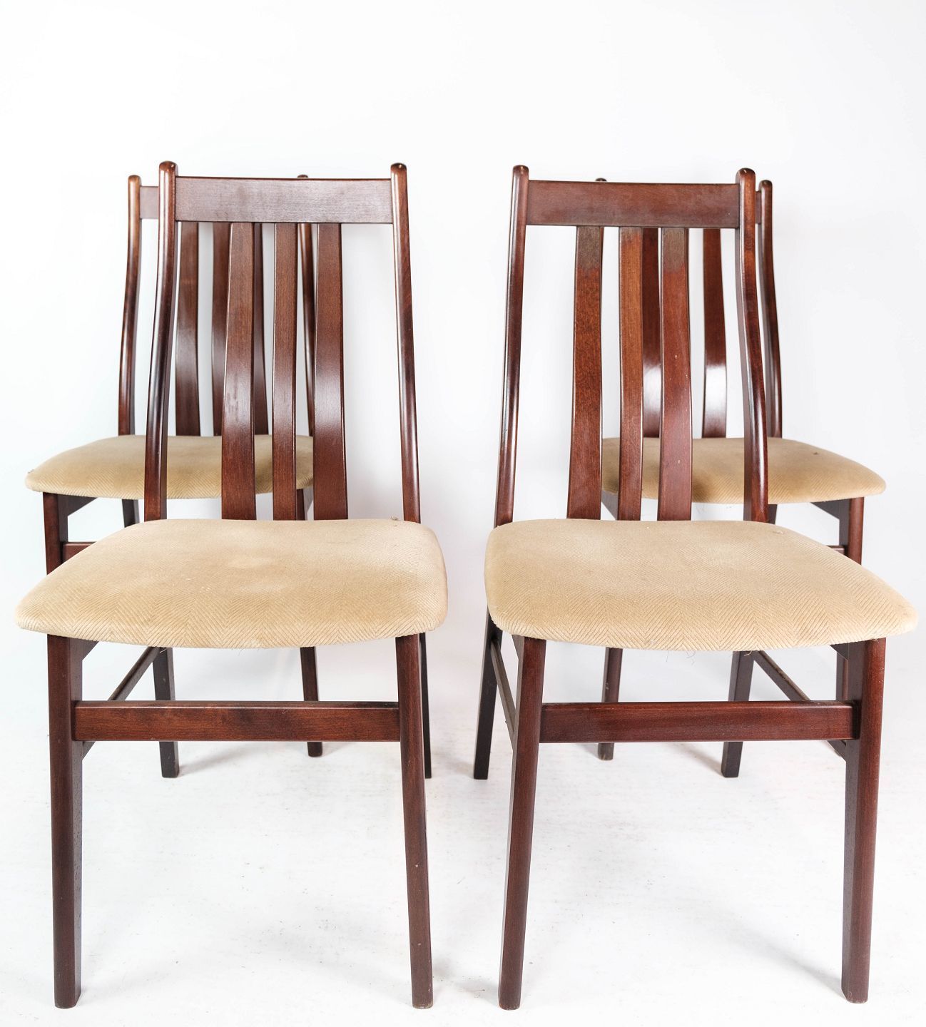 Set Of Four Dining Chairs In Mahogany And Upholstered With Light Fabric, Of Danish Design Made By Farstrup Møbler In The 1960s