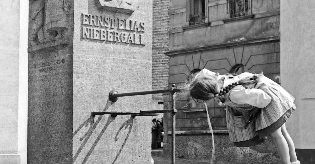 Karl Heinrich Lämmel Girl At Ernst Elias Niebergall Fountain Darmstadt, Germany 1938 Printed Later 1938/2021 photo furniture