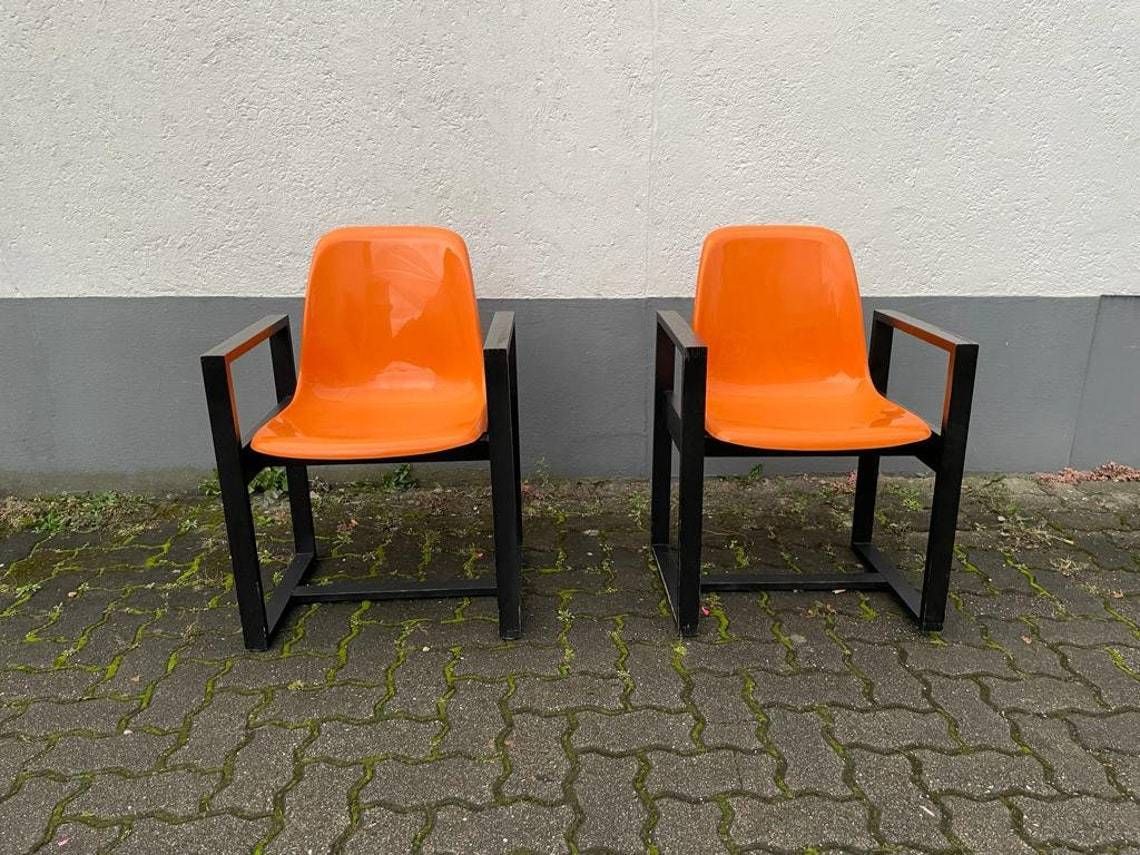 Titlespace Age Orange Plastic Seat And Wood Frame Pair Of Chairs By Möbel Mann 1960s Germany photo furniture