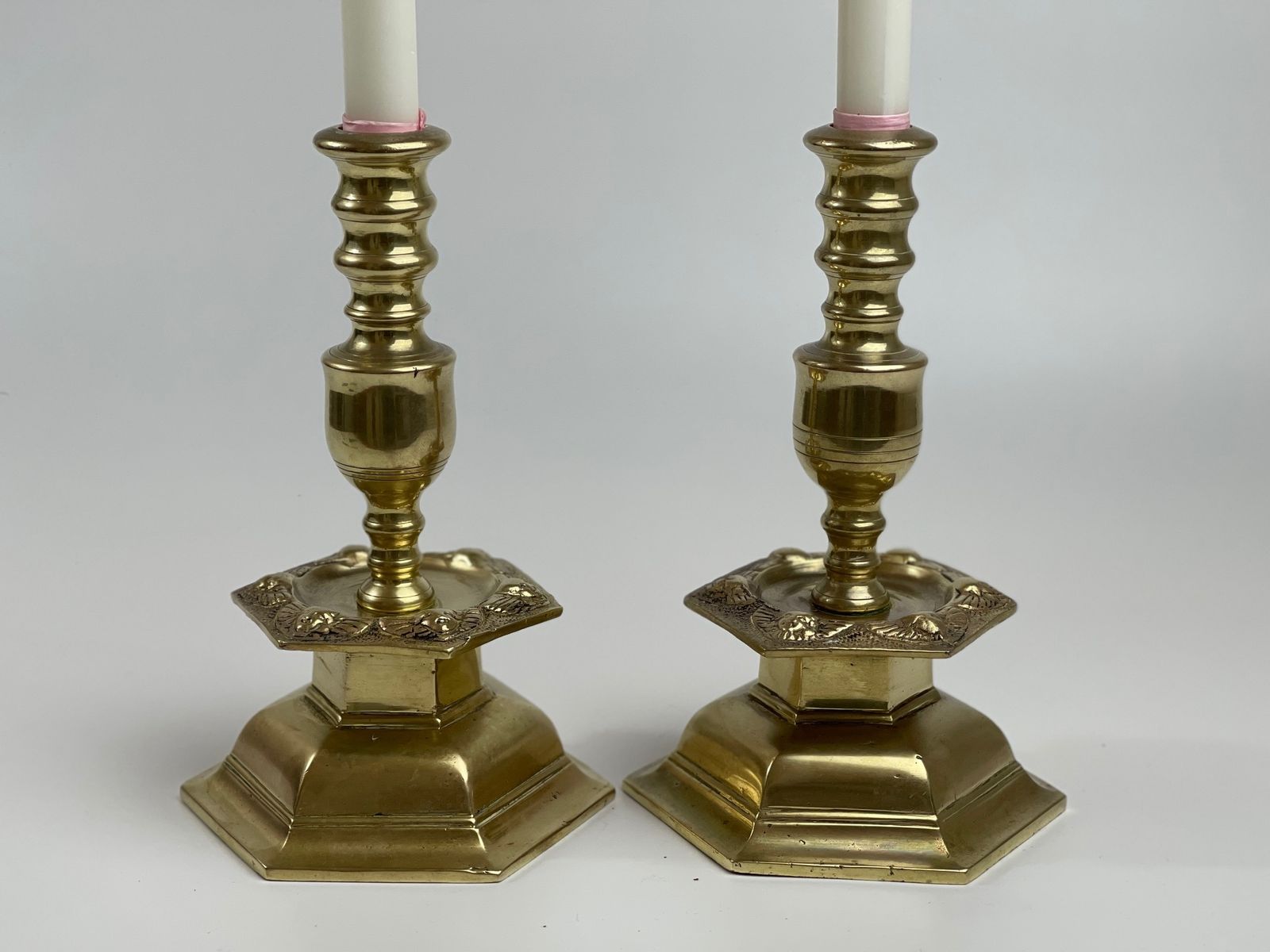 Pair Of Brass Candlesticks In Baroque Style. Hexagonal With Angels, Weight Approx. 2 Kilos Per Candlestick