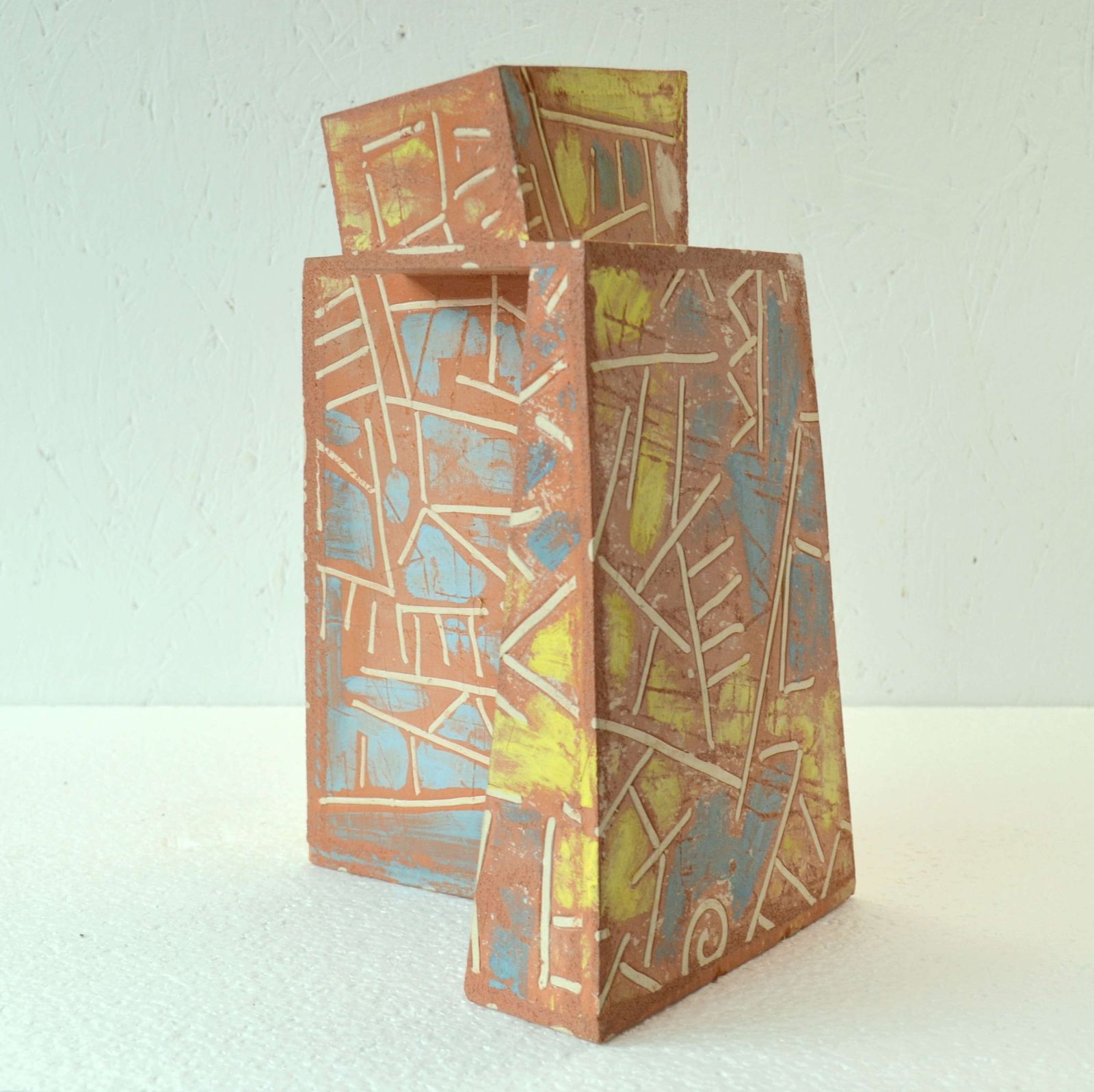 Terracotta Art Vase Decorated In Bright Colours photo vinterior