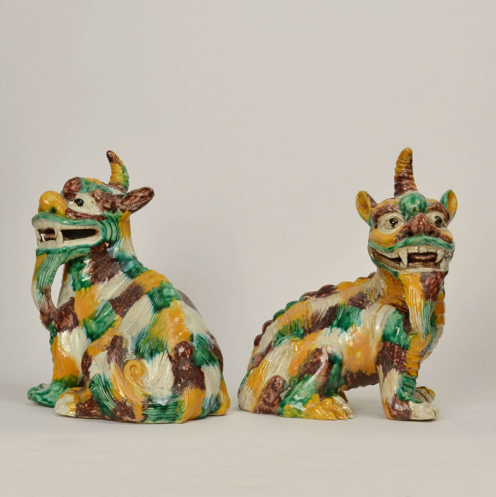 Pair Of Chinese Qilin 20th Century In Sancai Glazed Ceramic photo for sale