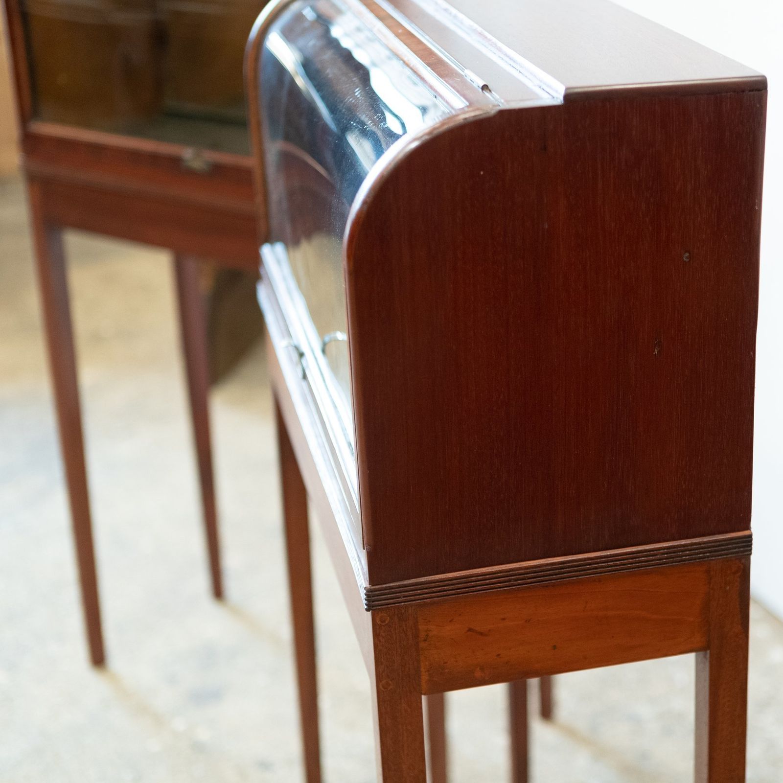 photo vintage Pair Of Antique Curved Glass Counter Display Cases On Legs
