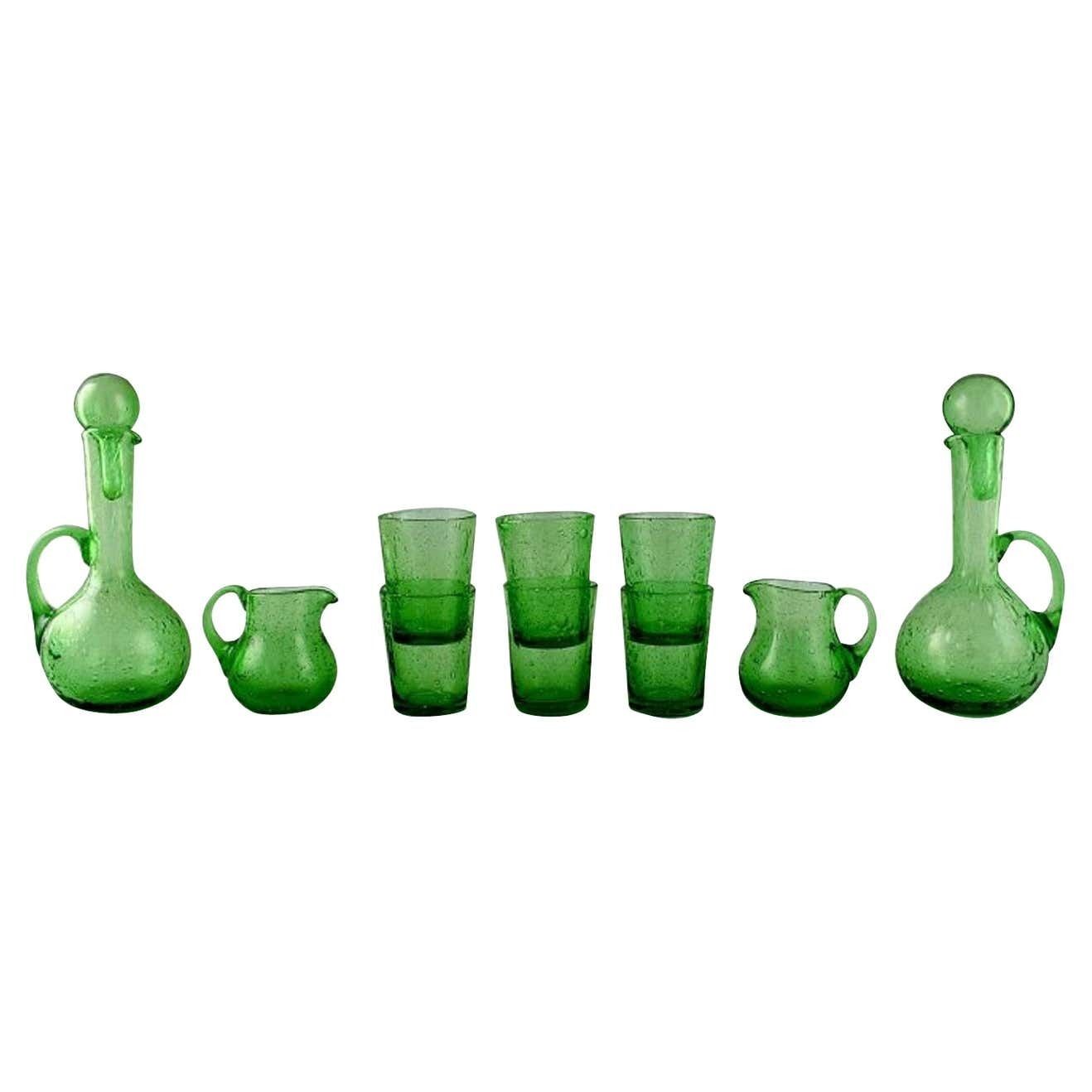 Biot, France, Two Decanters, Six Glasses And Two Small Jugs In Green Art Glass