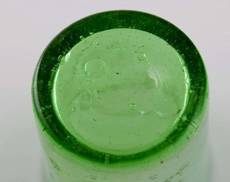 photo furniture Biot, France, Two Decanters, Six Glasses And Two Small Jugs In Green Art Glass