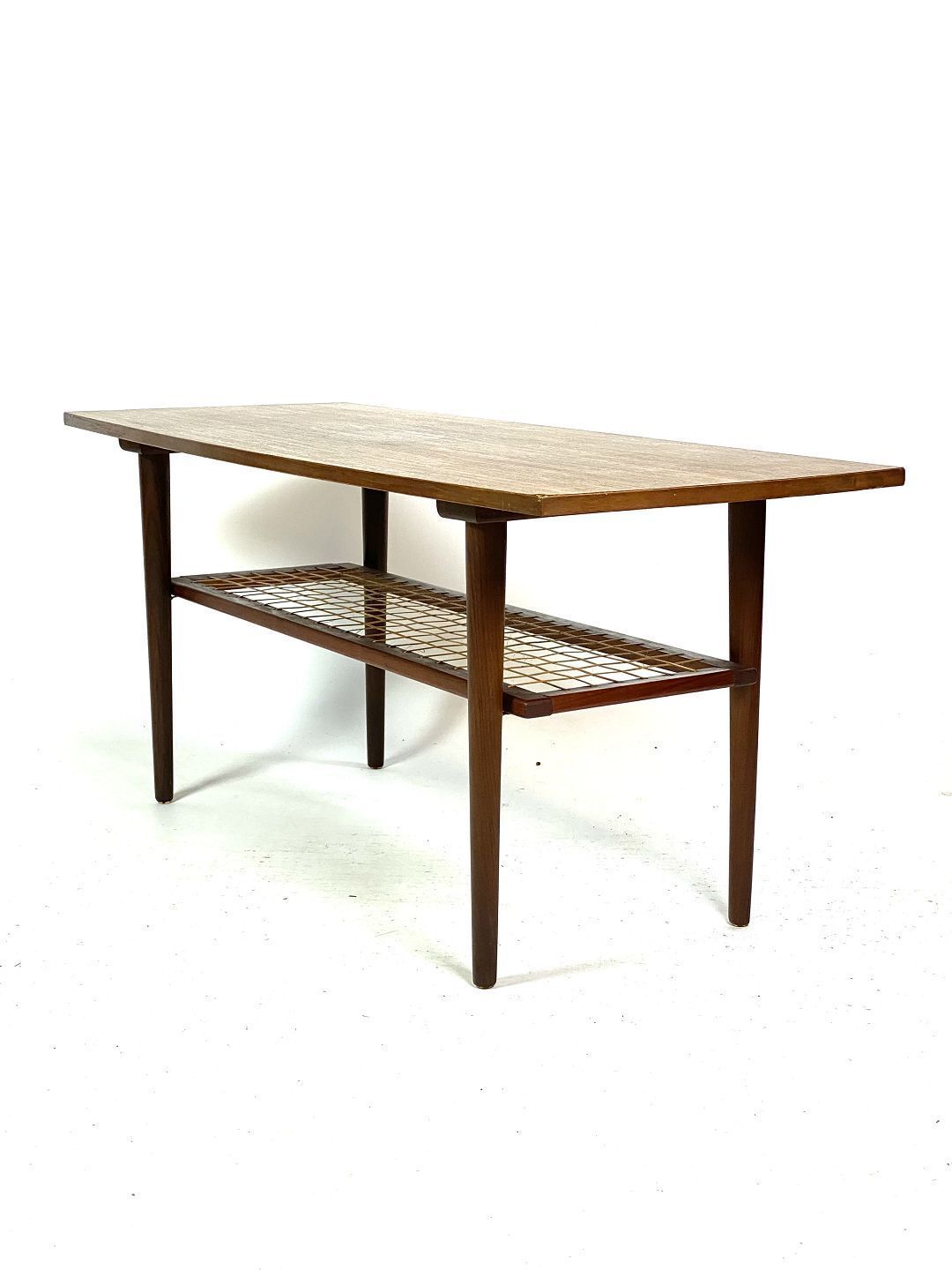 Coffee Table In Teak With Paper Cord Shelf Of Danish Design From The 1960s.