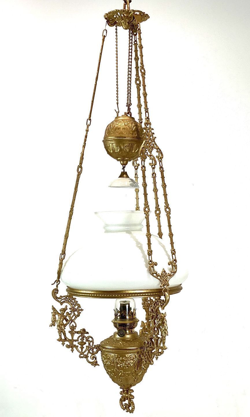 Large Kerosene Lamp Of Patinated Brass And Shade Of White Opaline Glass From The 1880s.