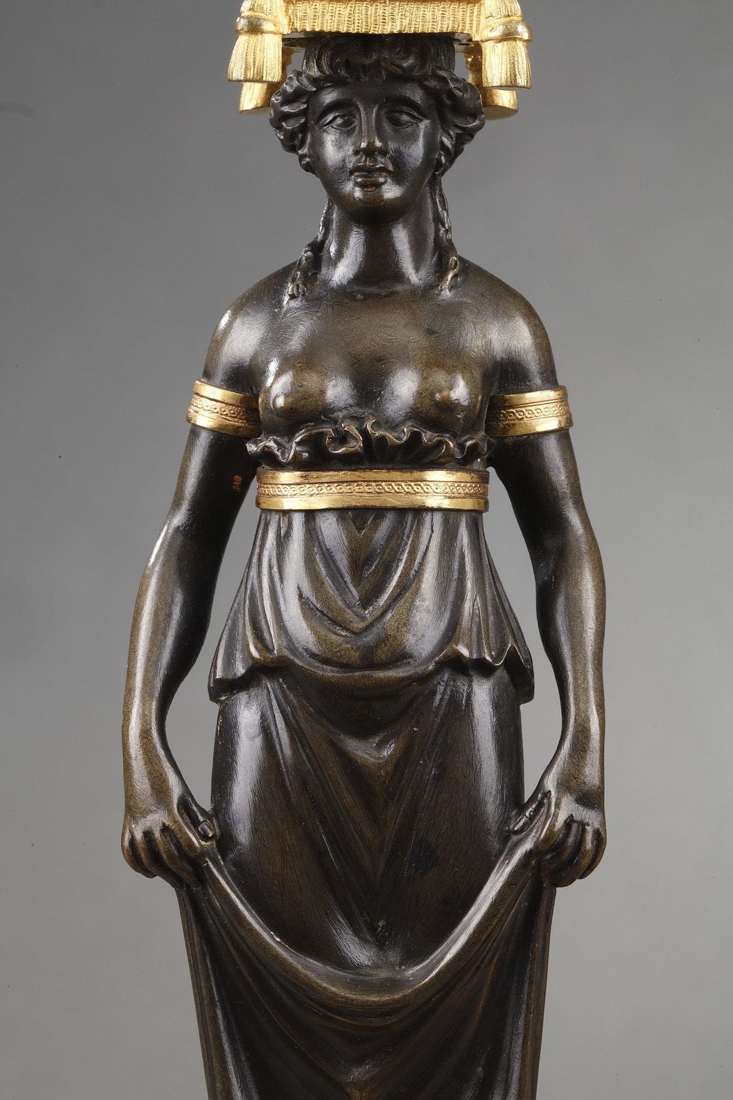 Paire de bougeoirs Charles X en bronze patiné et doré photo 3825.0