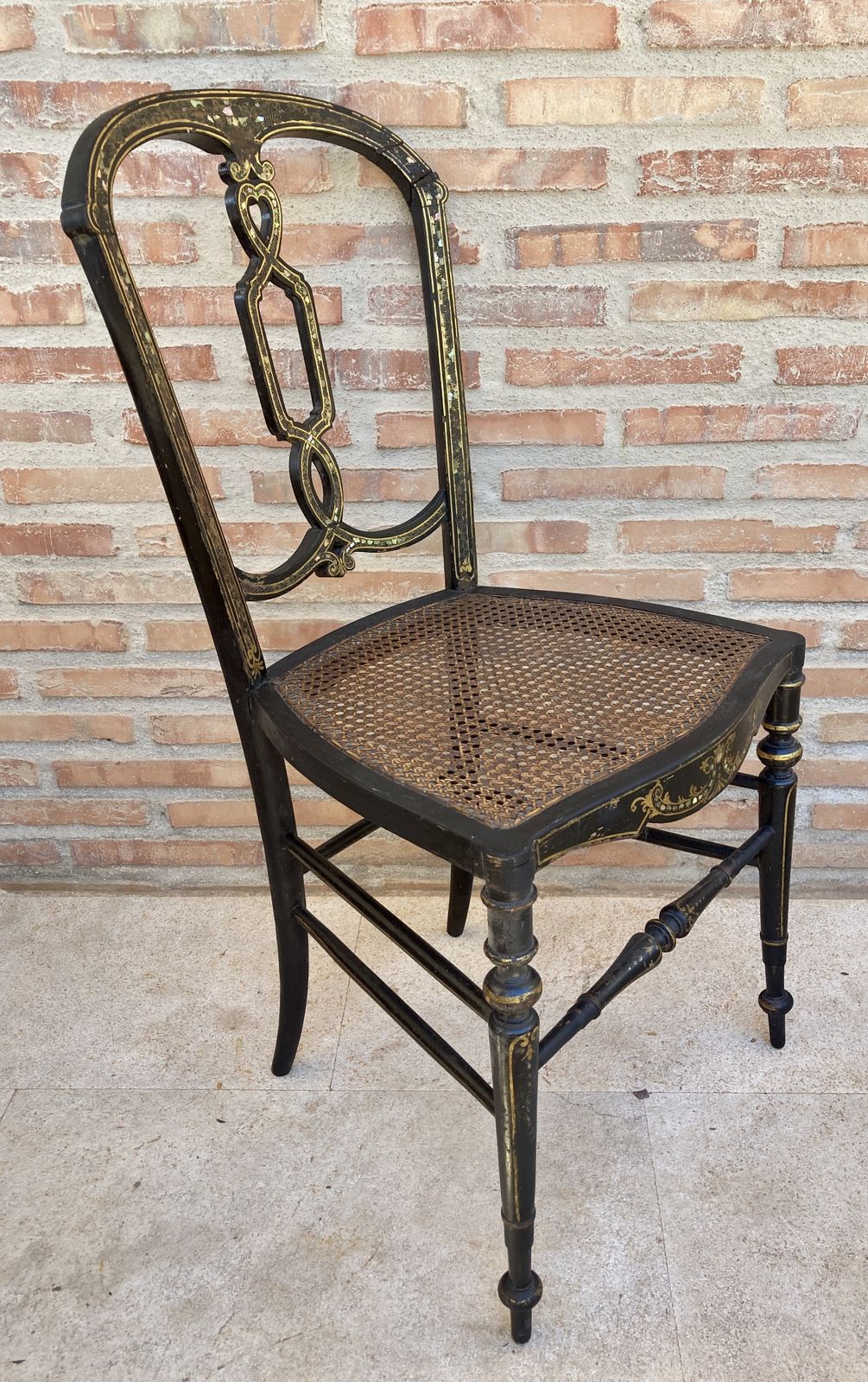 photo for sale Elizabethan Wood Chairs Lacquered In Black And Decorated In Gold With Mother Of Pearl Inlays With Wicker Seat, Set Of 2