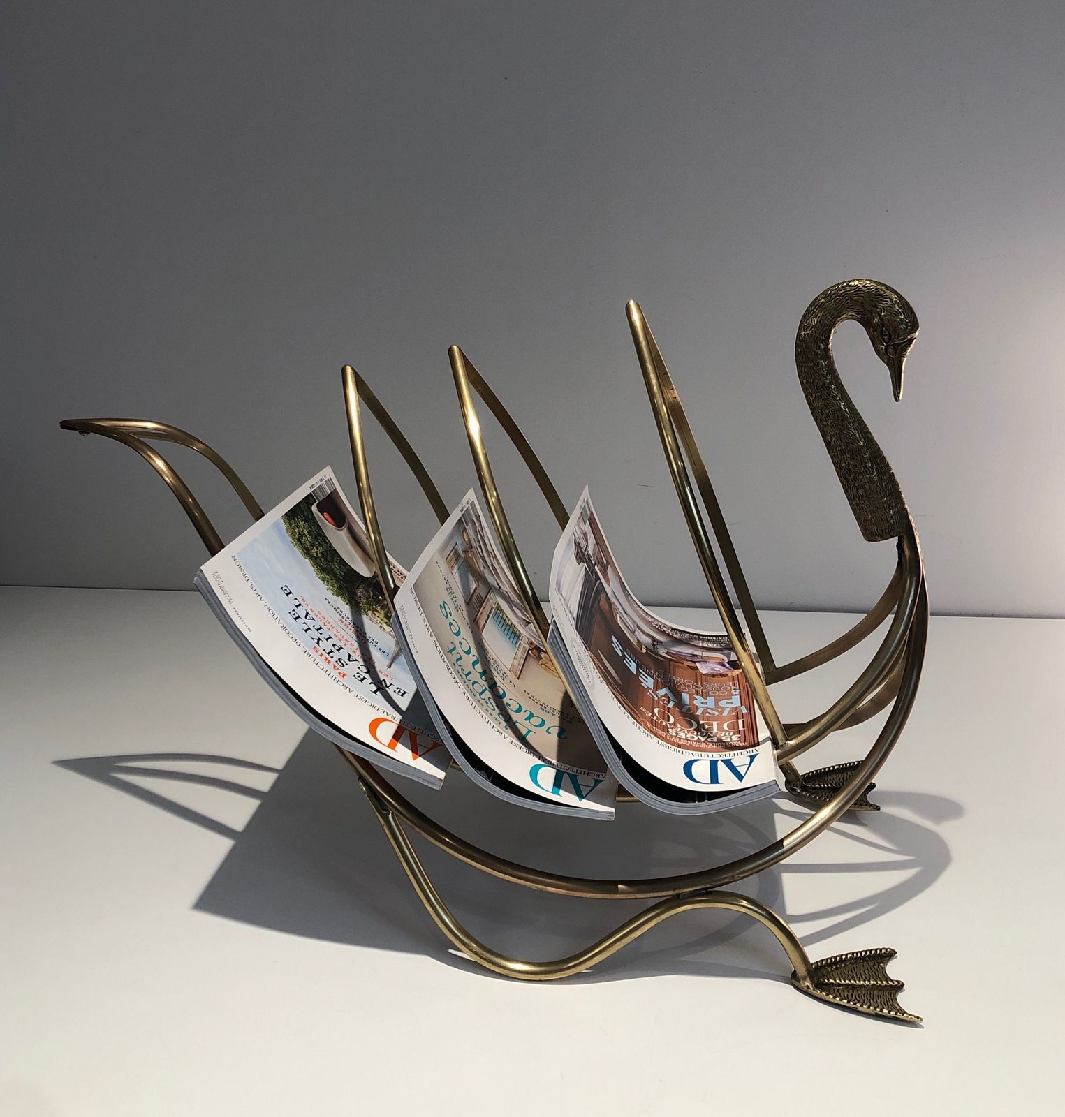 Swan Brass Magazine Rack, 1940s photo for sale