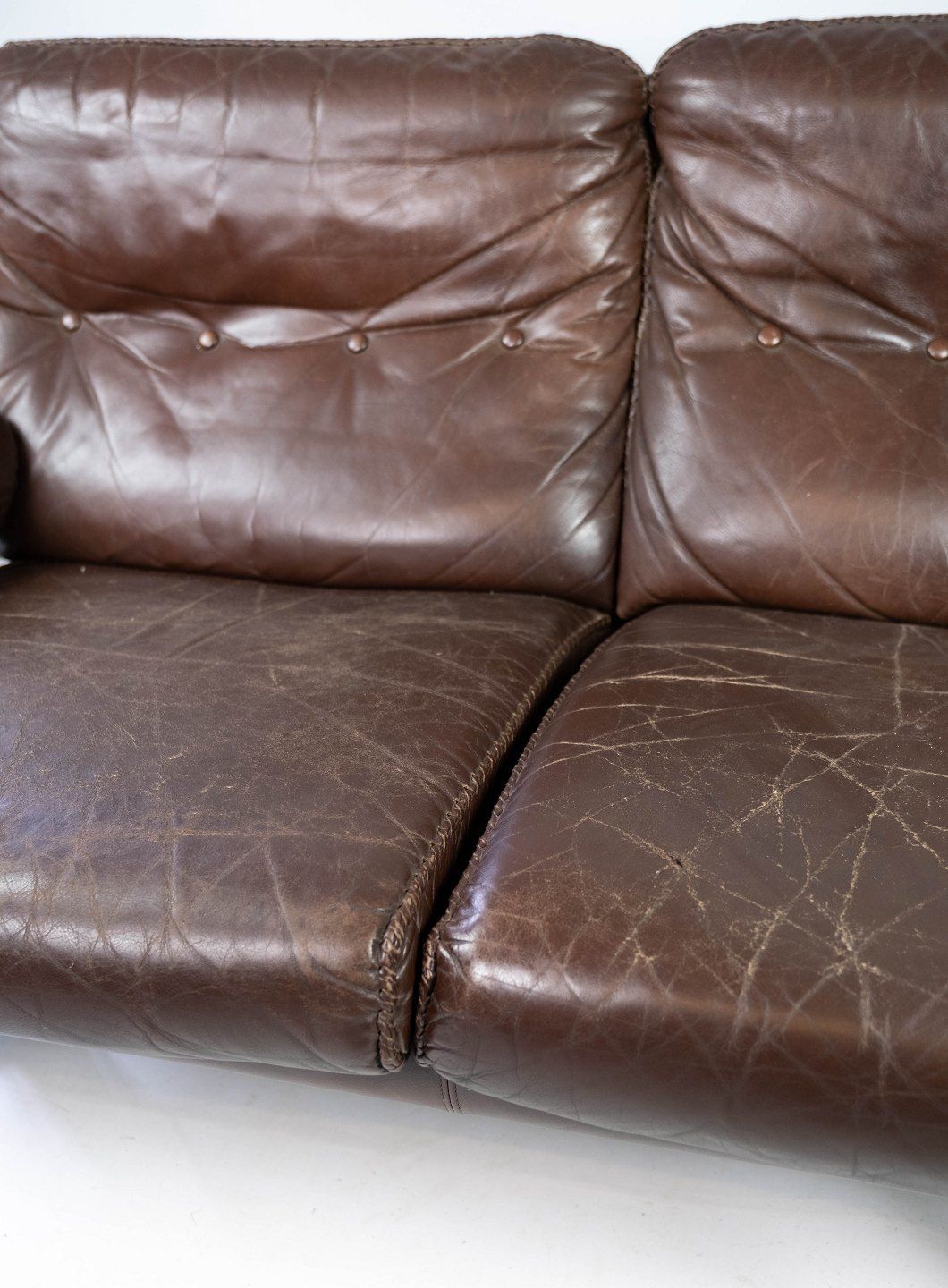 Two Seater Sofa In Brown Patinated Leather And Metal Frame, Designed By Arne Norell From The 1970s. photo buy