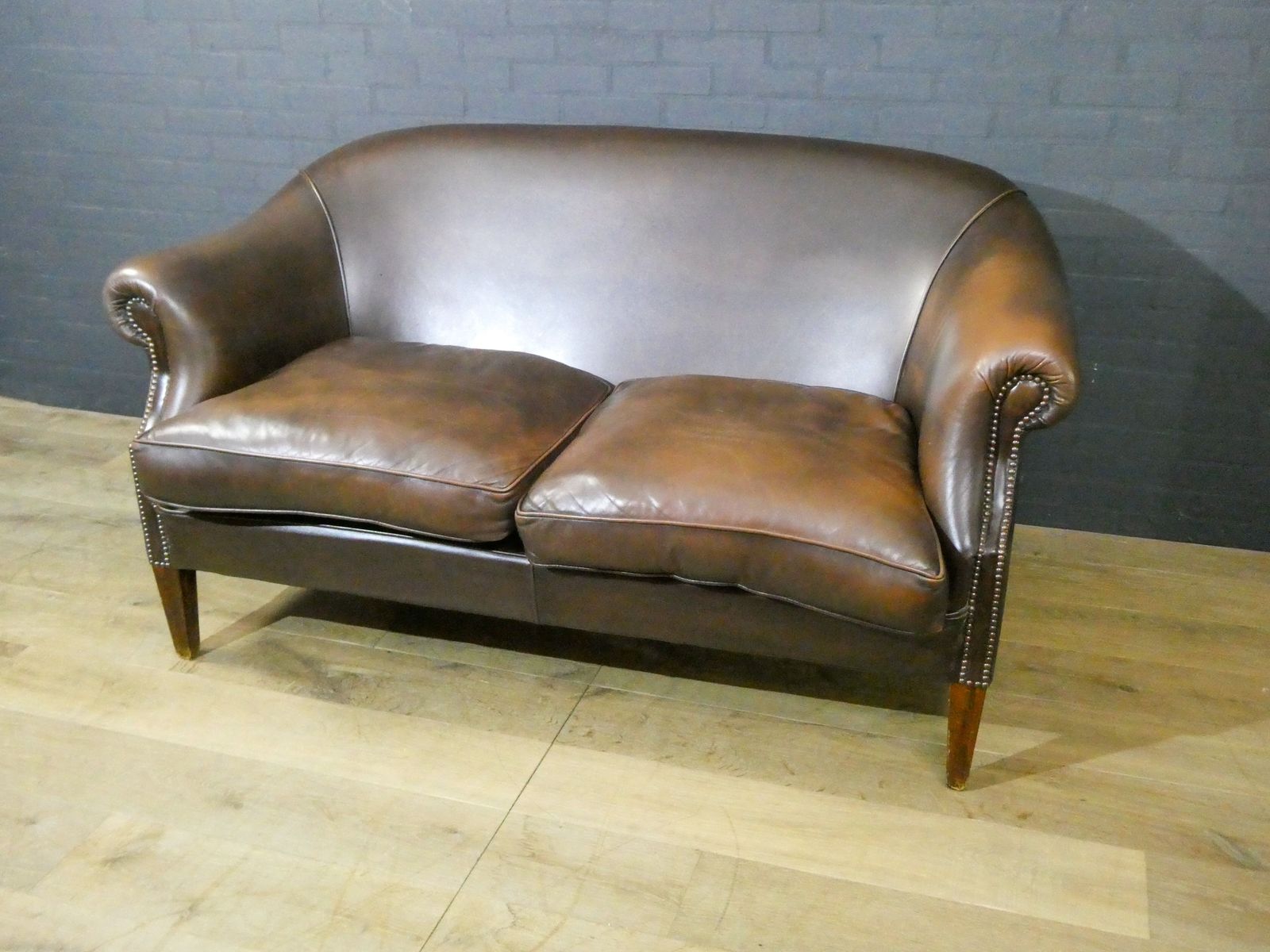 2 Seater Leather Sofa In Dark Brown photo for sale