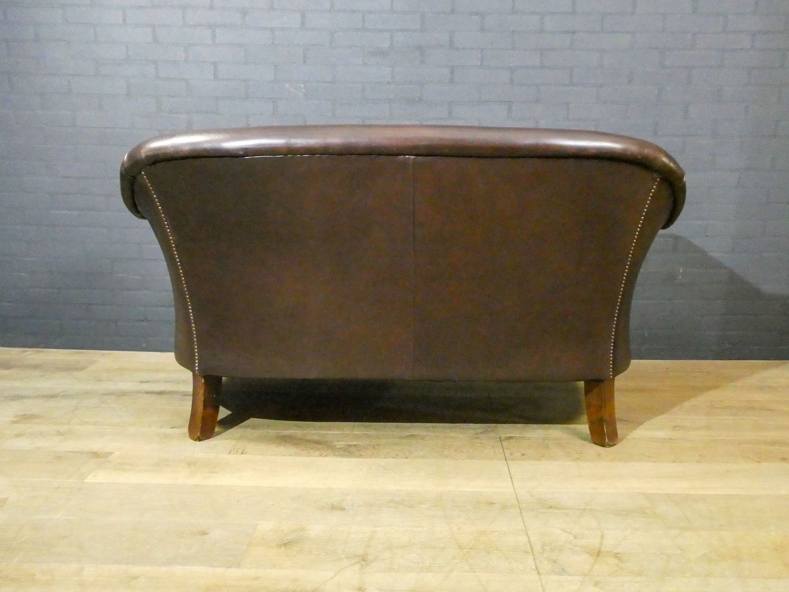 2 Seater Leather Sofa In Dark Brown photo buy