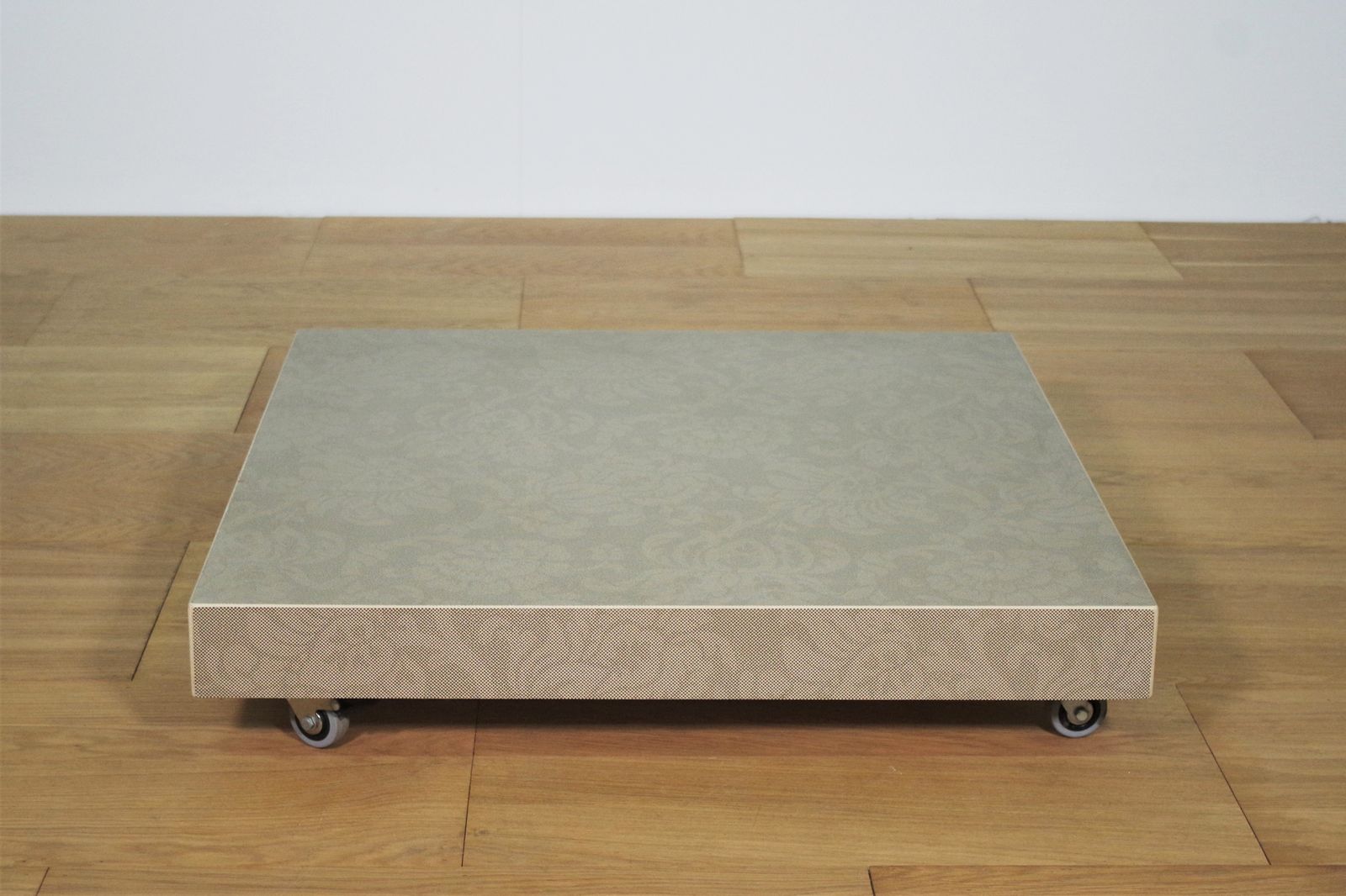 Low Coffee Table In Ceramic Glass Of Artisan Design With Wheels Of The 2000s photo vinterior
