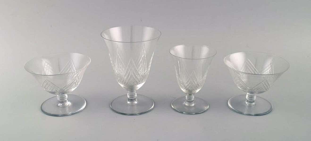 Saint Louis, France, Four Glasses In Clear Mouth Blown Crystal Glass, 1930s photo furniture