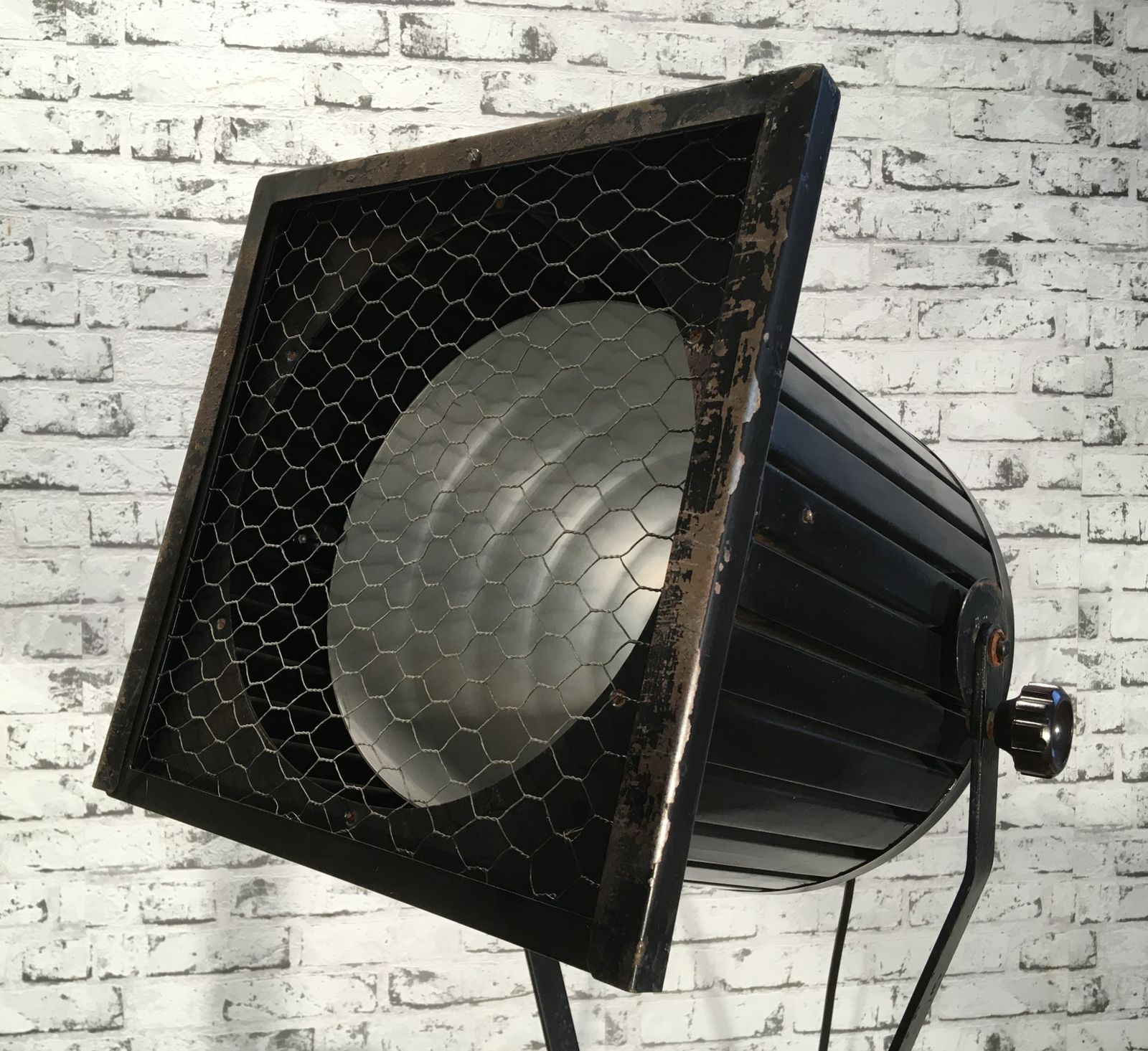 599.0 Black Vintage Industrial Spotlight On Wooden Tripod  photo