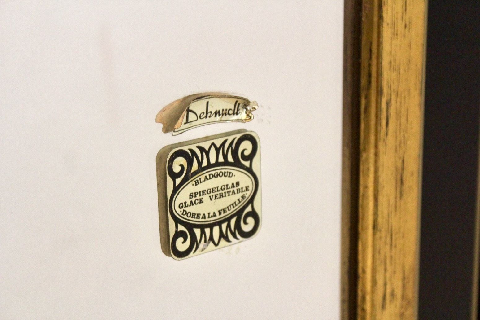 photo furniture Giltwood And Black Glass Mirror By Deknudt Belgium