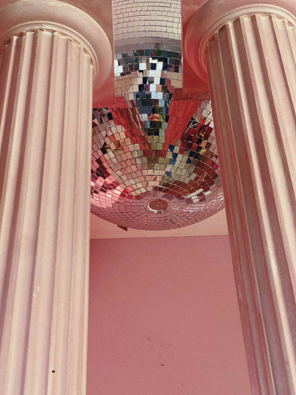 Pair Of Large Pink Plaster Pillars. Italian 1980s photo furniture