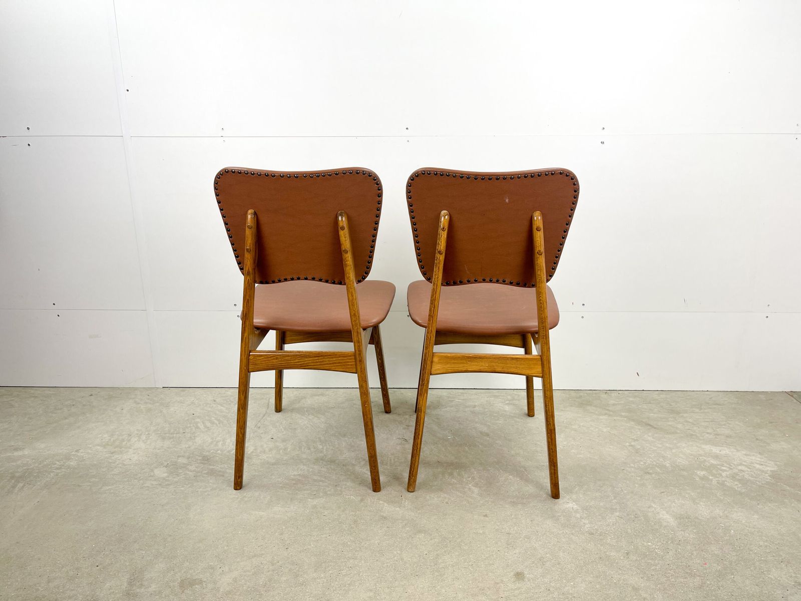 Wooden Retro Chairs With Brown Leatherette photo vintage