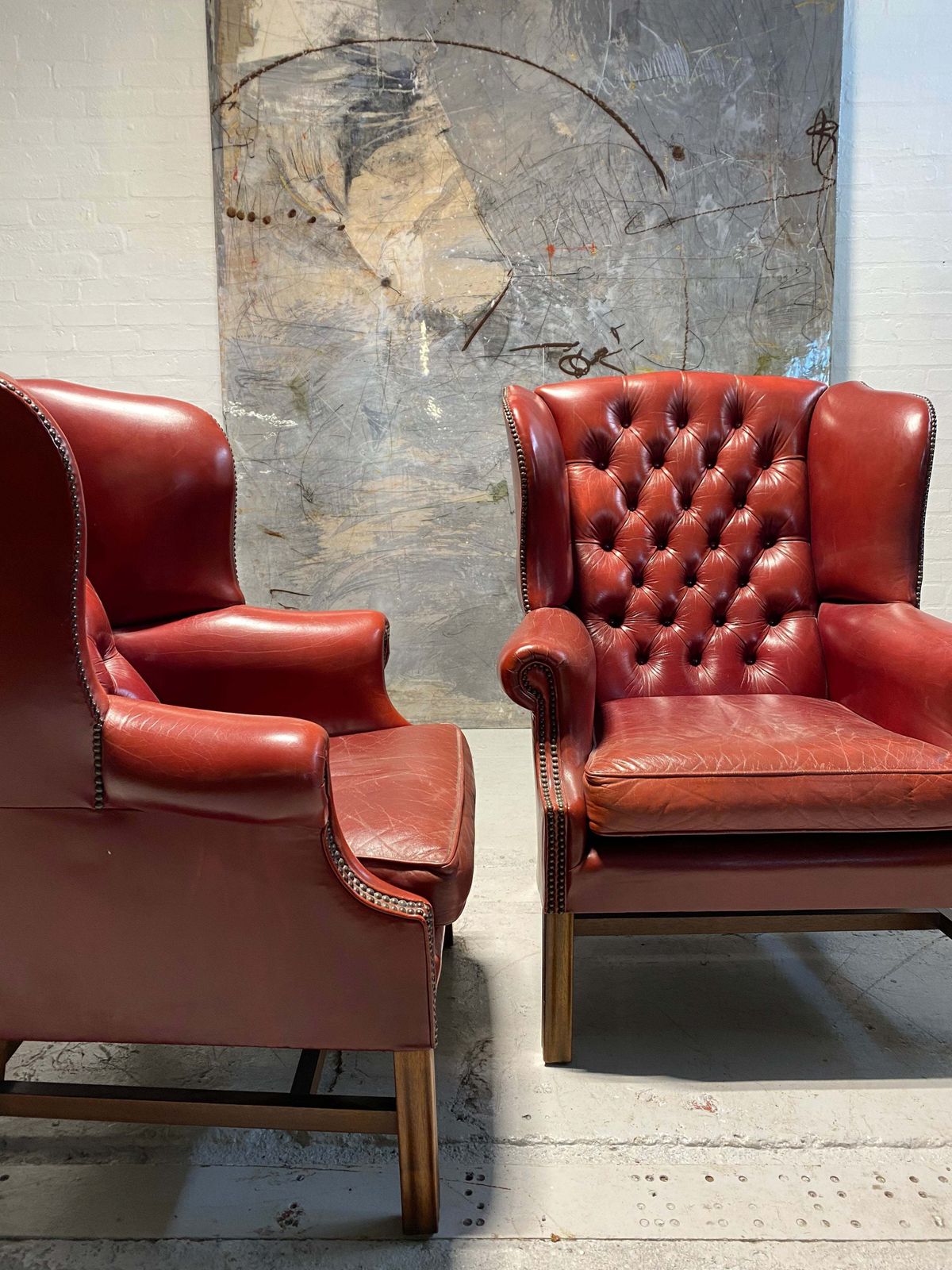 A Very Good Matching Pair Of Midc Gentleman’s Wing Chairs In Raspberry Leather photo 3499.0