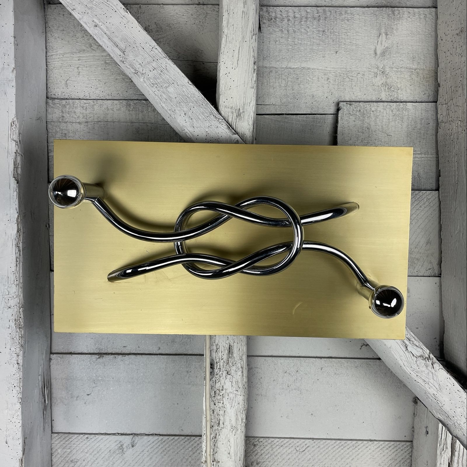 A Pair Of 1970s Italian 'Reef Knot' Wall Light Panels / Sconces Designed By Giacomo Benevelli For Missaglia photo for sale