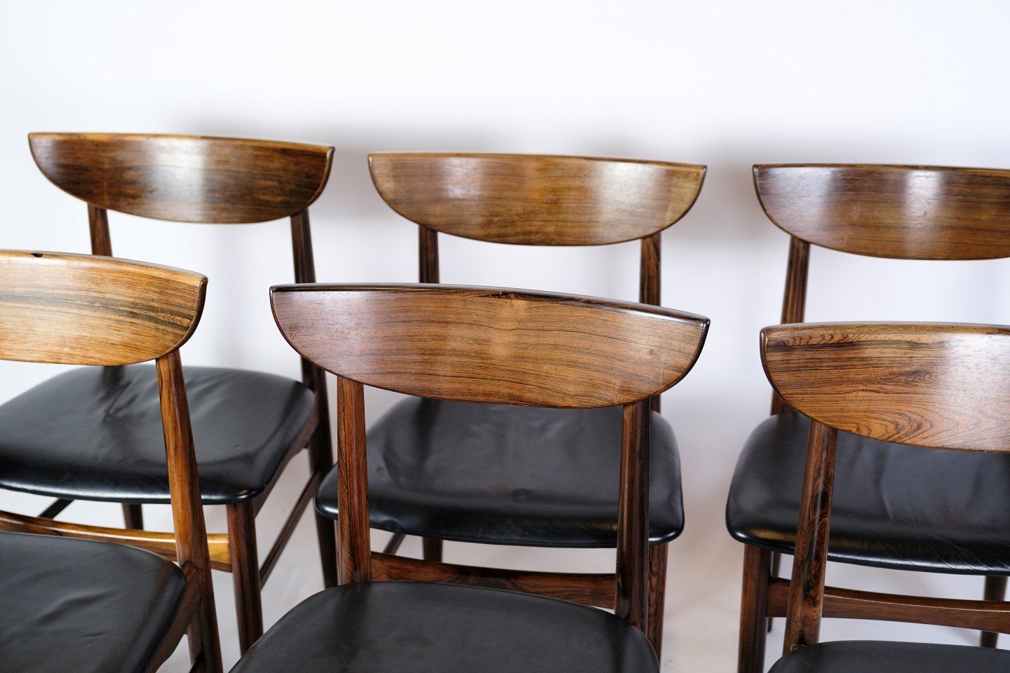 A Set Of Six Dining Table Chairs Of Danish Design In Rosewood With Black Leather From The 1960s. photo furniture