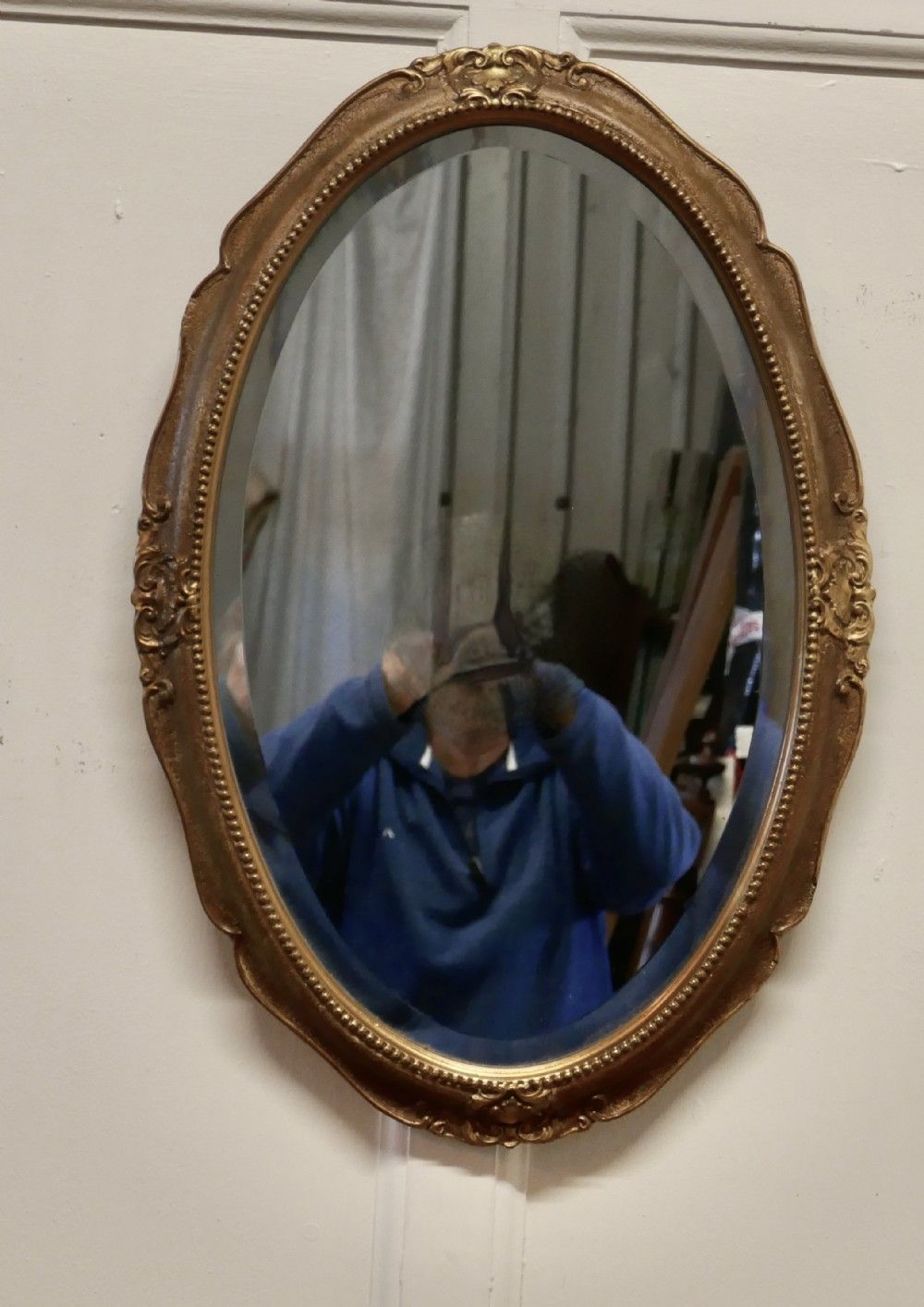 An Art Deco Oval Gilt Wall Mirror photo for sale