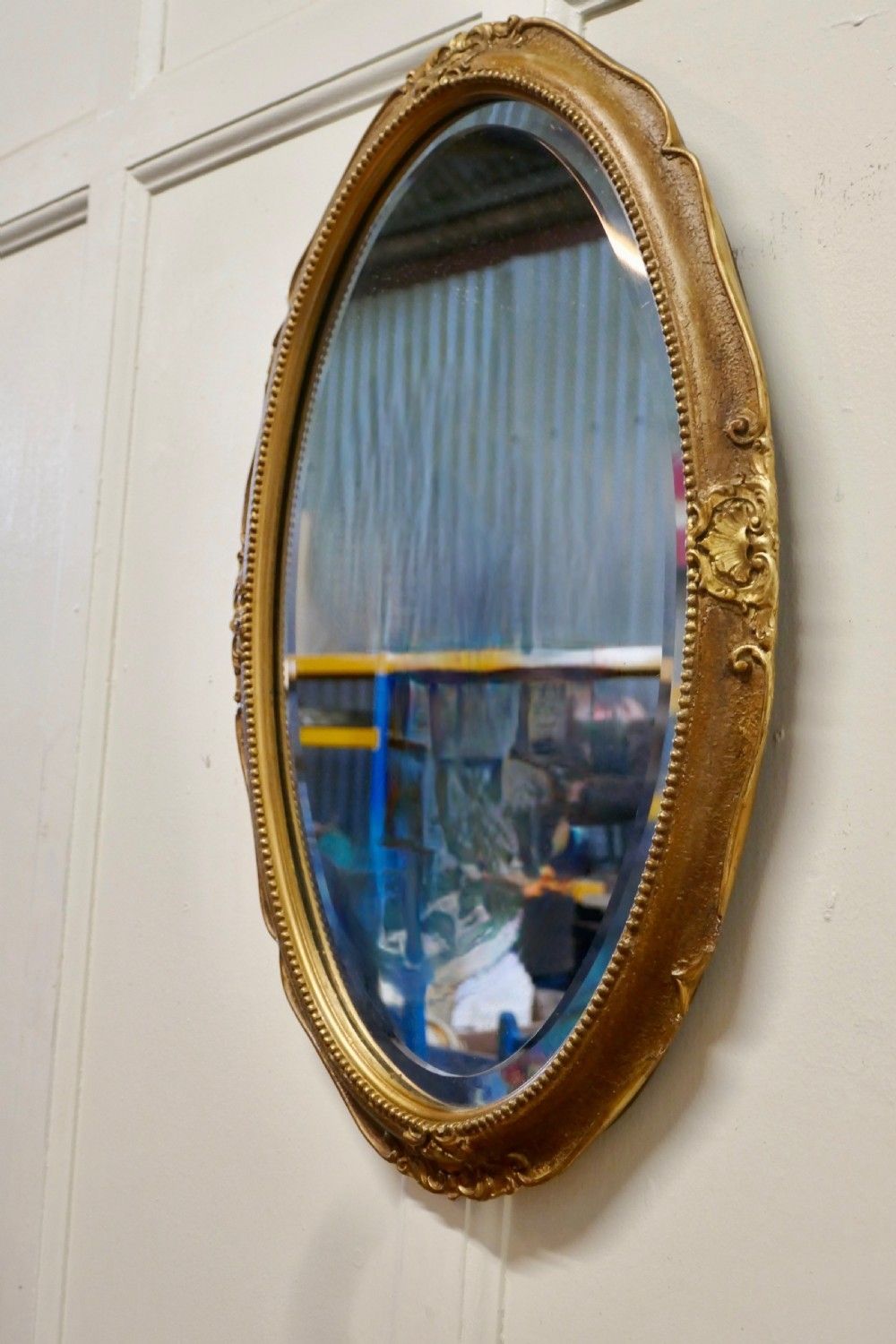 An Art Deco Oval Gilt Wall Mirror photo vinterior