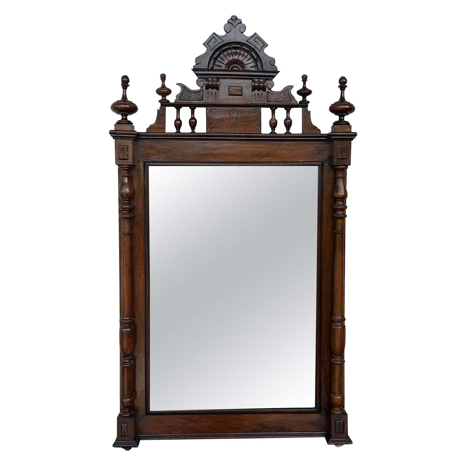 Early 20th French Ebonized Mirror With Turned Columns And High Carved Details