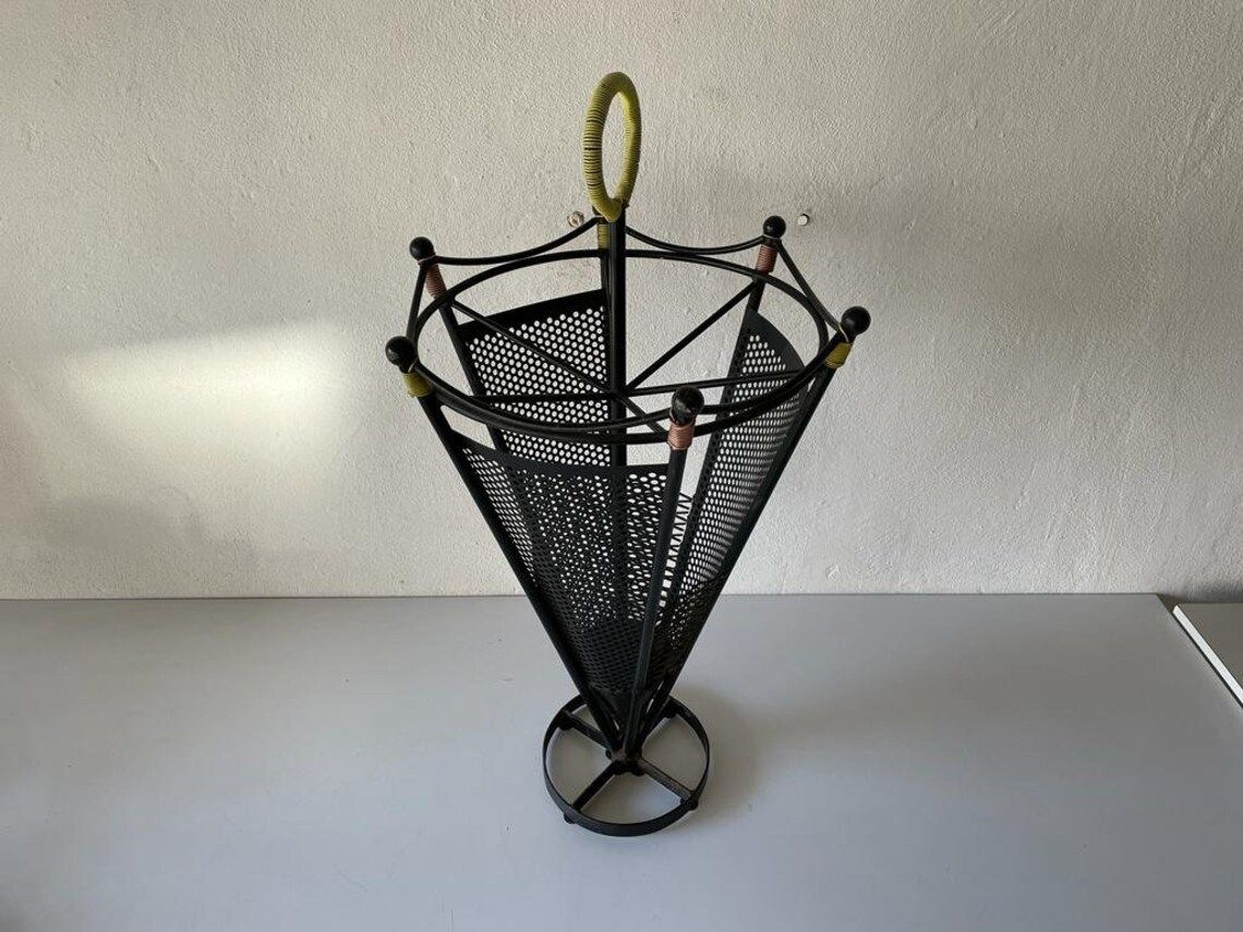Black Metal 6 Slot Umbrella Stand With Yellow Circle Handle, 1950s photo furniture