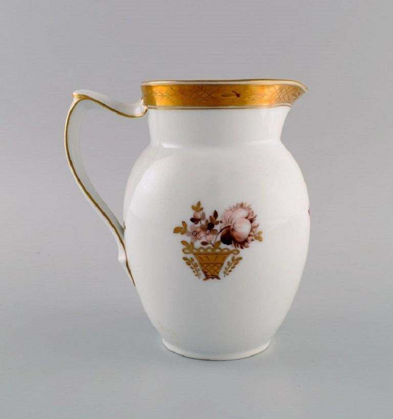 Royal Copenhagen Golden Basket Jug In Porcelain With Flowers And Gold Decoration photo furniture