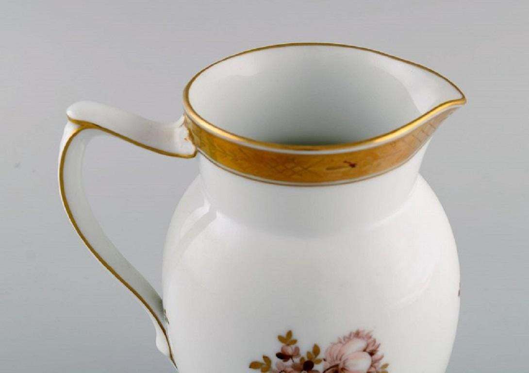Royal Copenhagen Golden Basket Jug In Porcelain With Flowers And Gold Decoration photo for sale