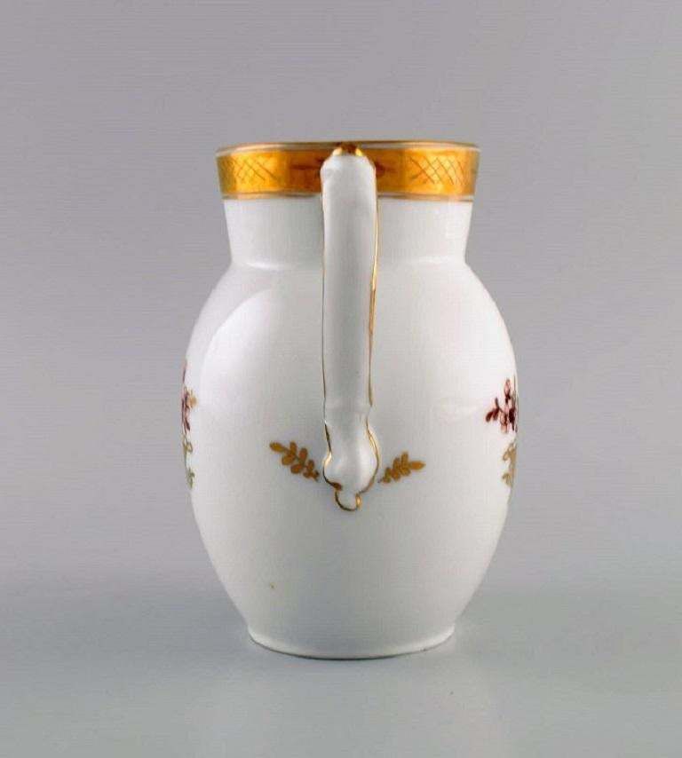 Royal Copenhagen Golden Basket Jug In Porcelain With Flowers And Gold Decoration photo Home Decor
