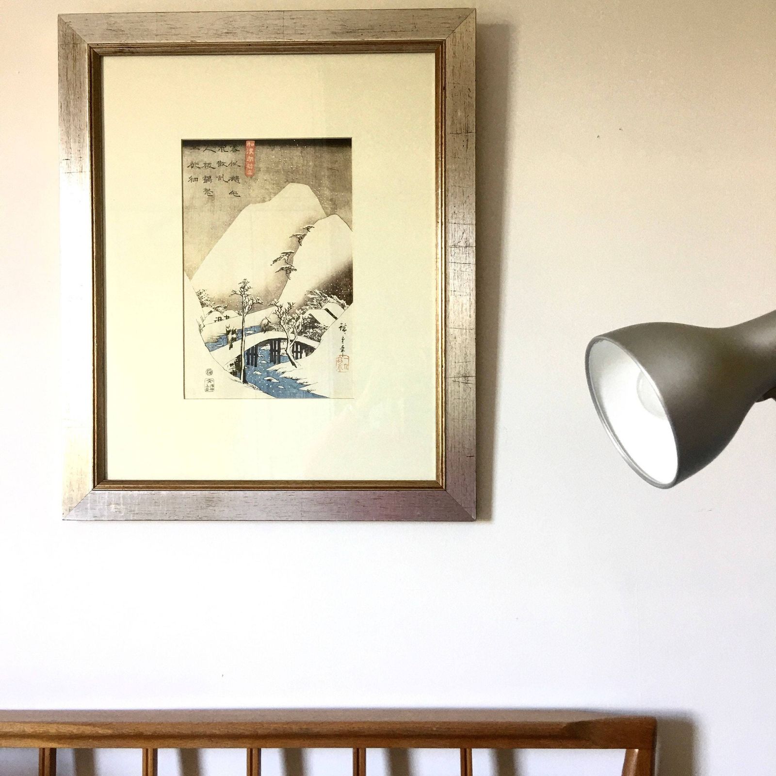 Print Of Japanese Snowy Scene With Bridge In Centre Of Picture Framed In Silver With Gold Inner Boarder photo Art