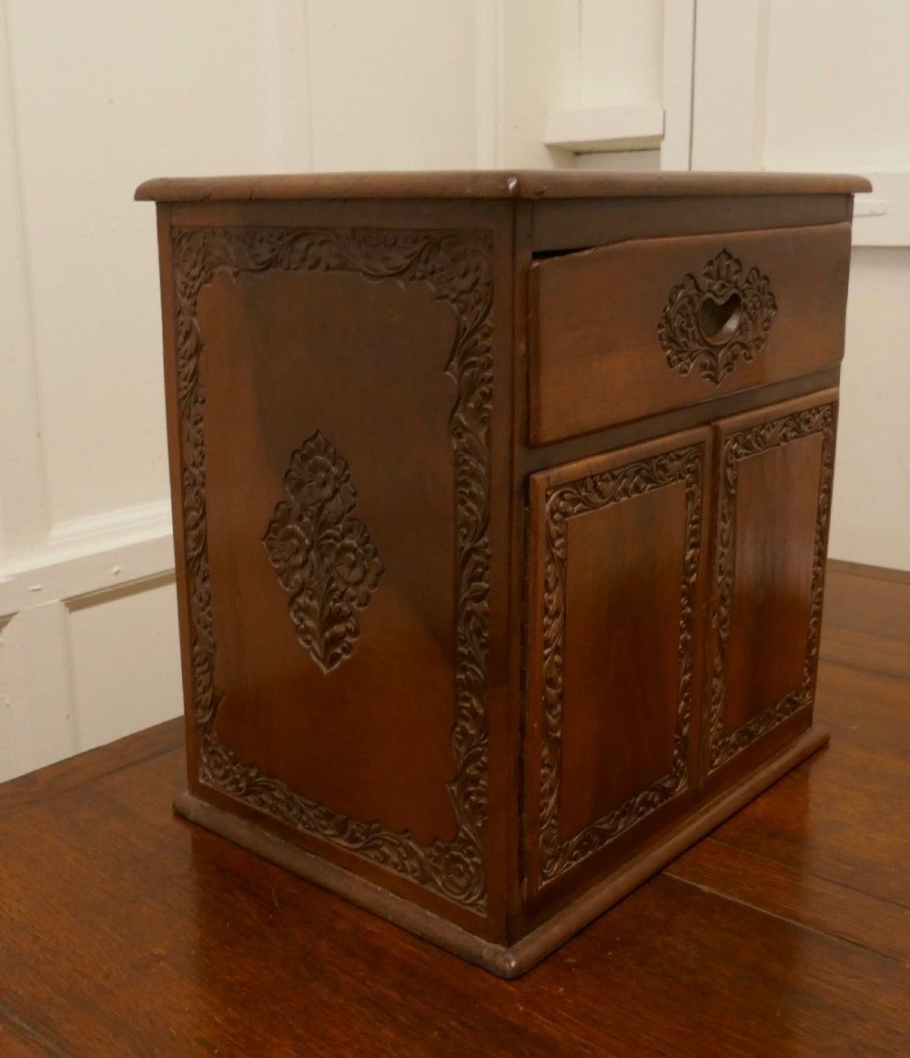 Small Carved Cupboard With Drawer photo for sale
