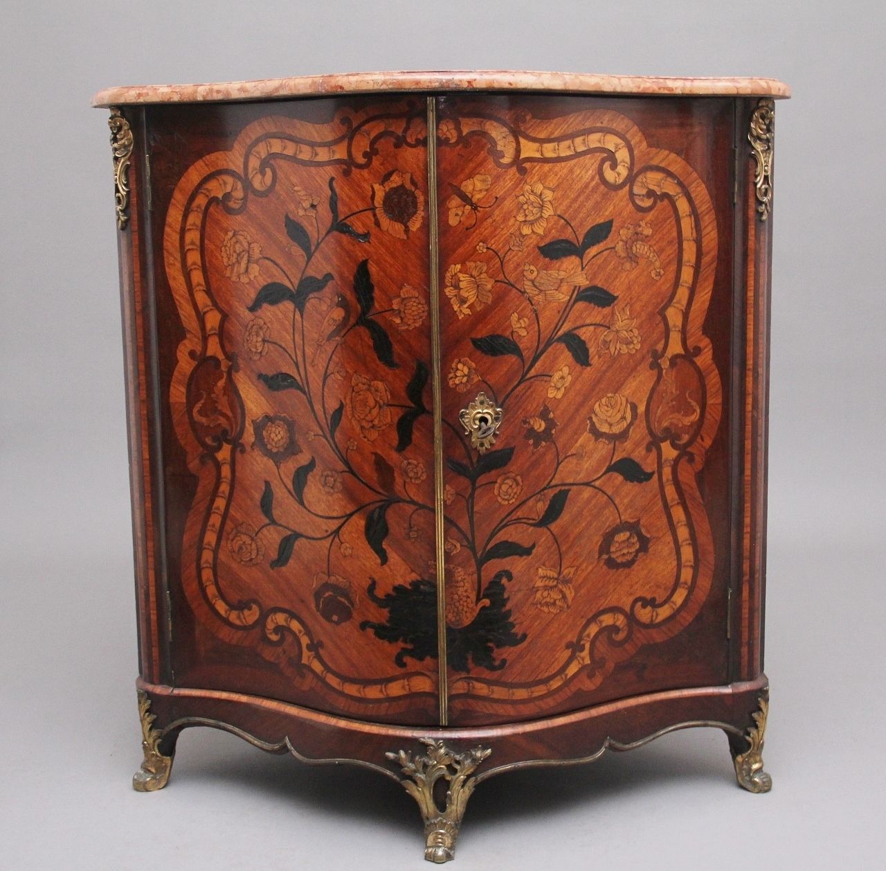 photo for sale 18th Century French Inlaid Tulipwood And Marble Top Corner Cupboard