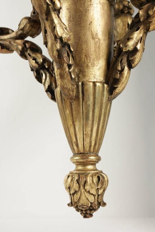 Chandelier In Hand Carved Gold Giltwood From The 19th Century photo vinterior